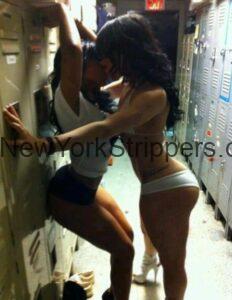 Strip club dressing room in NYC with costumes, makeup stations, and heels